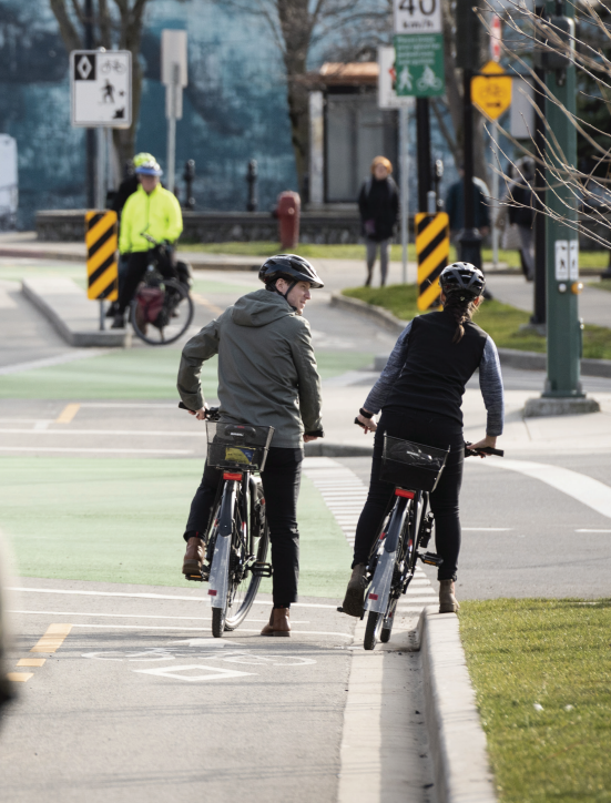 commuters using bikes and bike lanes instead of vehicles